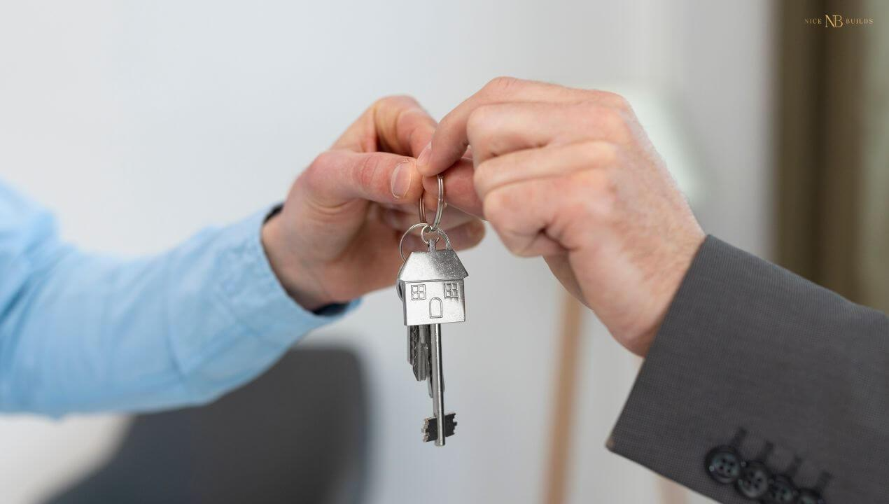 Home keys are being handed to the owner after project completion, the last among all stages of building a house.