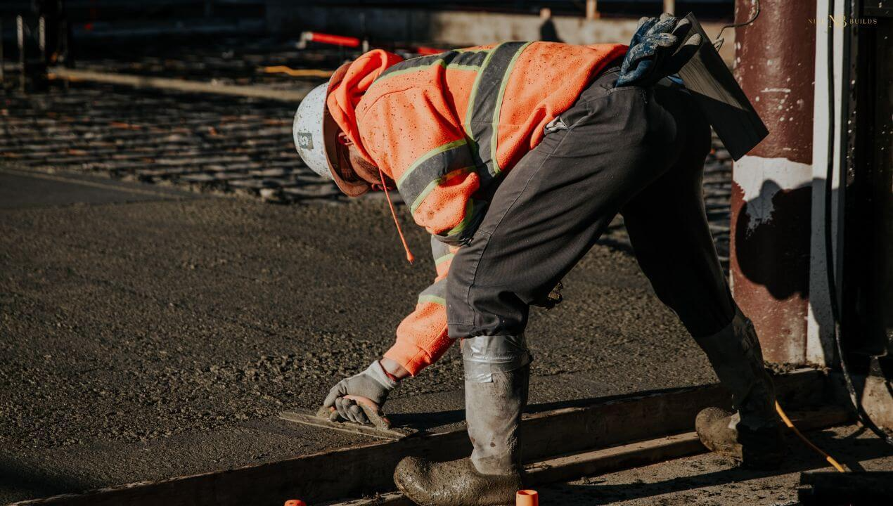construction worker building the foundation of a home.