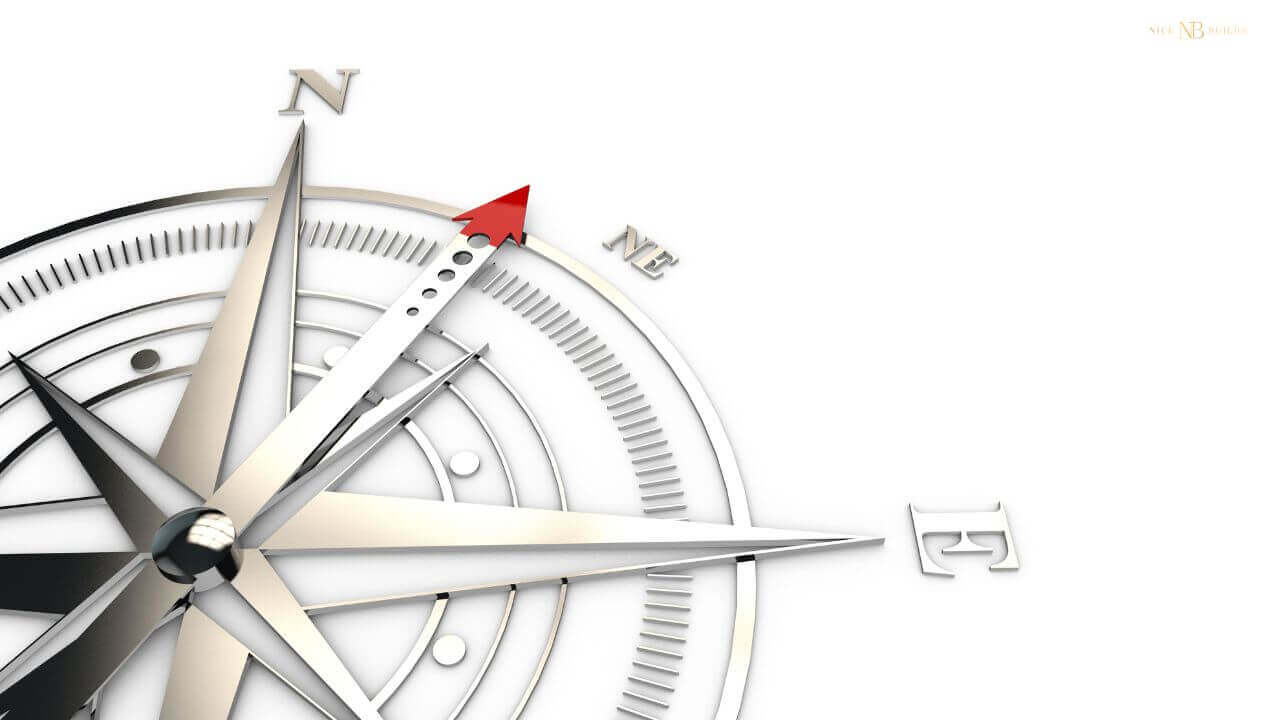 a compass determining what the best house orientation for Australians can be!