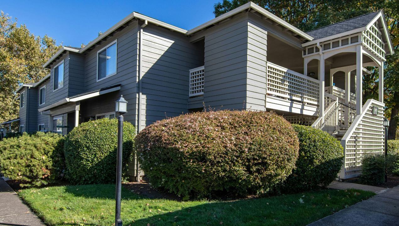 A grey colored two storey home